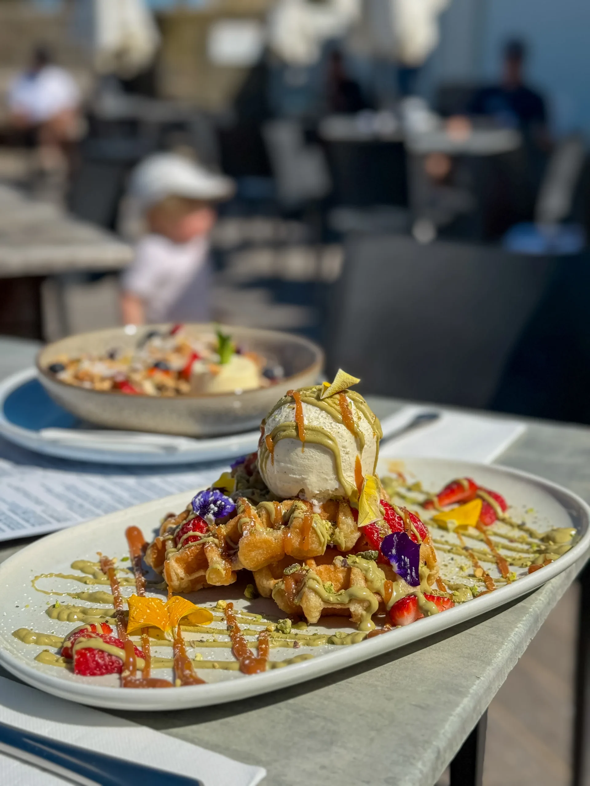 PISTACIO PAPI WAFFLES 24 strawberries, vanilla ice cream, crushed pistachios, salted caramel (v, n)