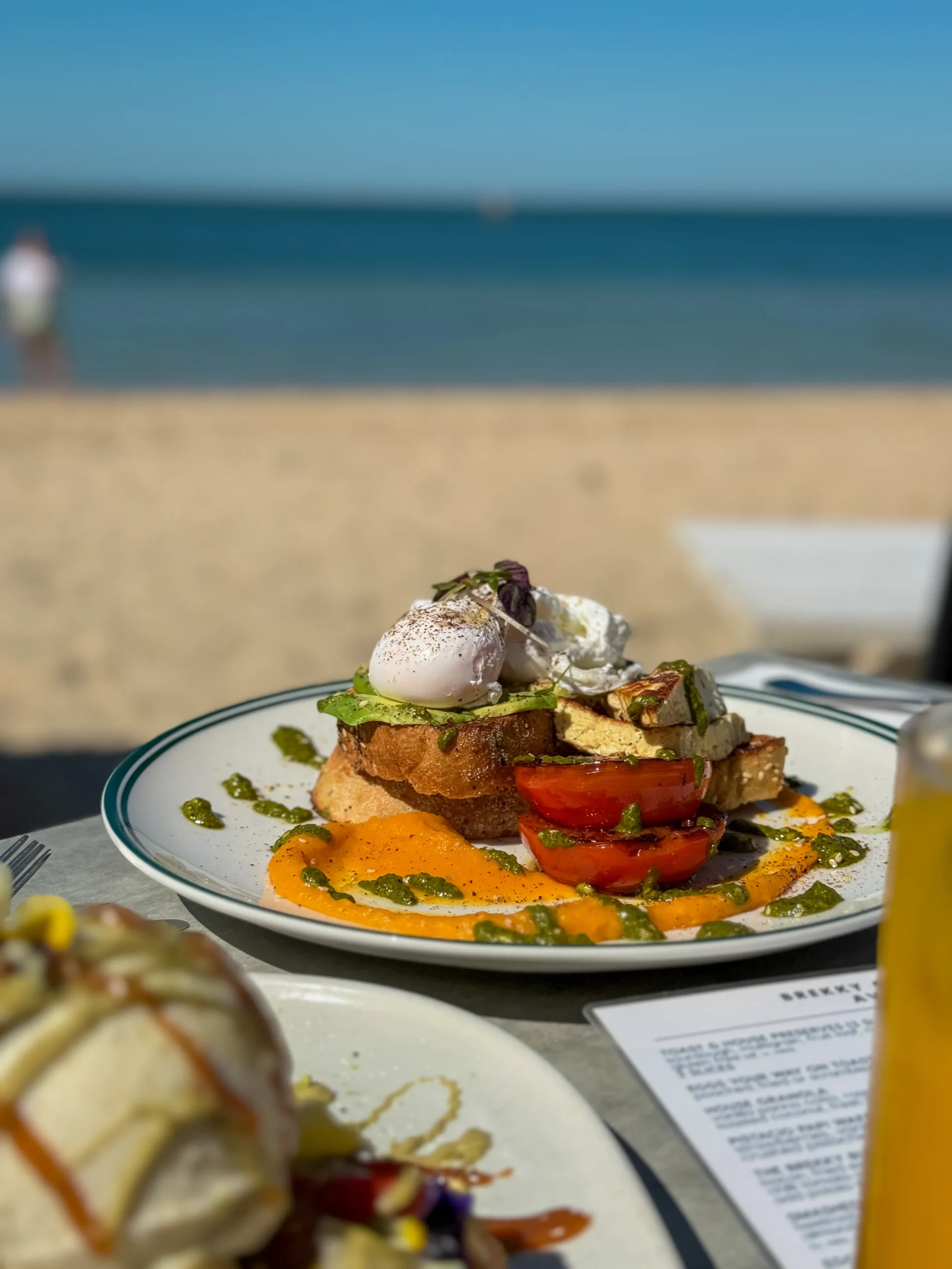 HALLOUMI & EGGS 26 pumpkin purée, balsamic tomatoes, avocado, pesto, dukkah, poached eggs, multigrain toast (v, gfo, dfo, n)