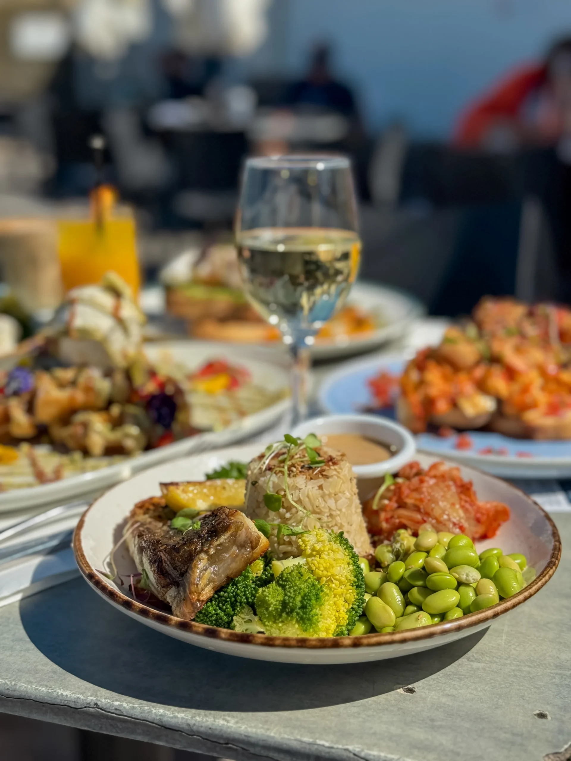 BARRA BOWL 29 grilled spring creek barramundi, brown rice, broccoli, kale, kimchi, furikake, edamame, toasted sesame dressing (gfo, dfo, veo, n)