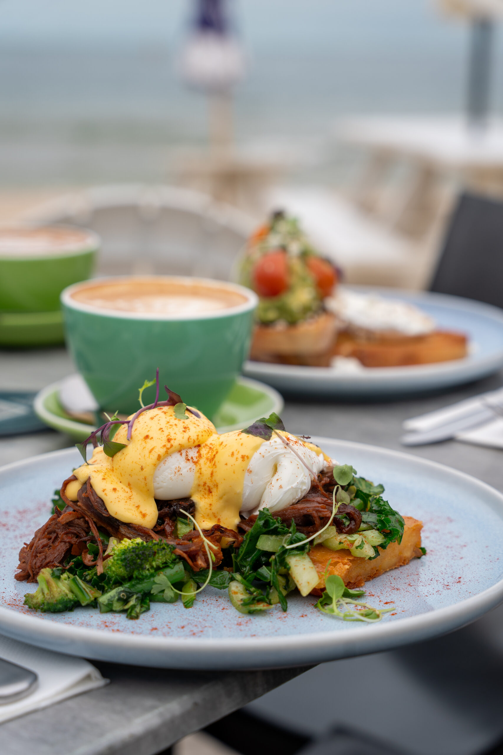Classic Eggs Benedict breakfast served with creamy hollandaise sauce