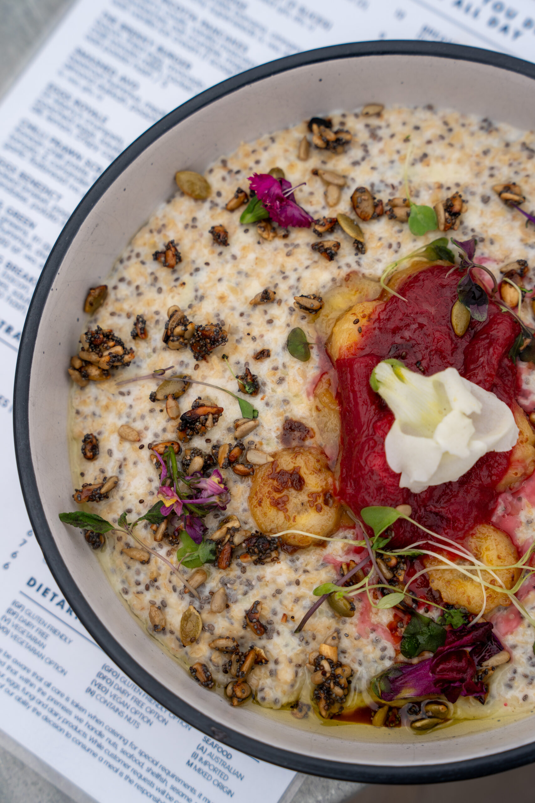 Healthy oat and chia porridge breakfast served with seasonal toppings